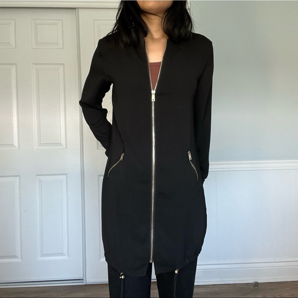 NWOT Dynamite Long Black Zip up Jacket. Women’s size XS.